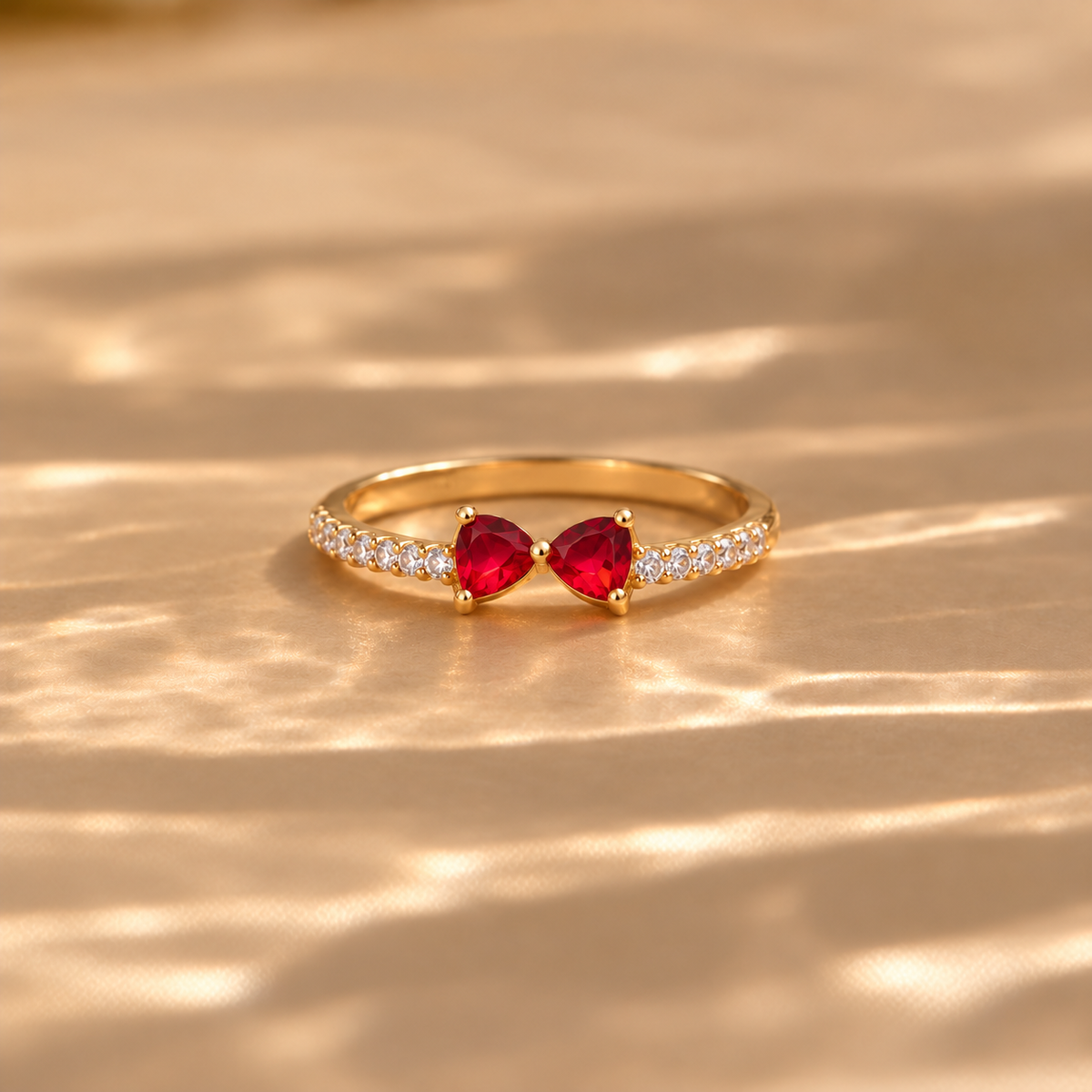 Gold-Tone Red Bow Ring with Clear Stone Accents